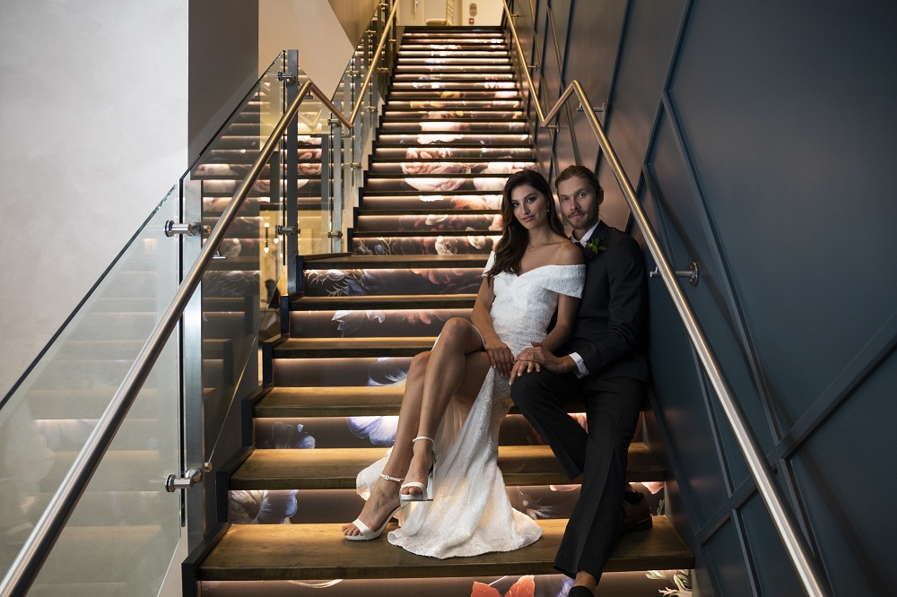 Bride and Groom on the lobby stairs