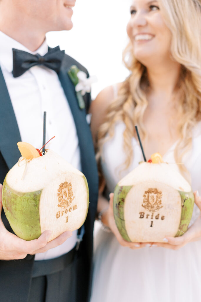 Watercolor Crests on coconut drinks with the Bride and Groom